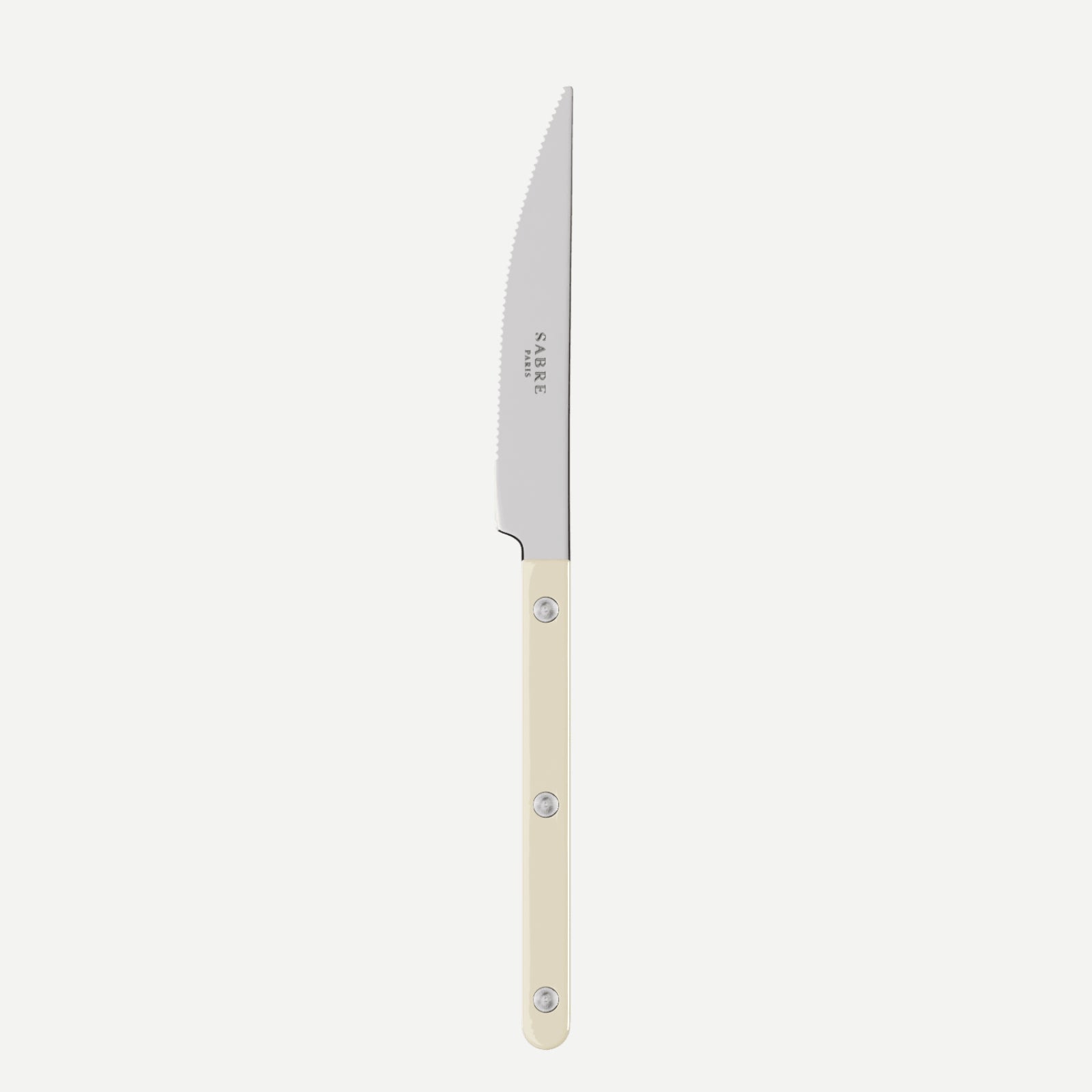 Knife with a white handle on a light beige background
